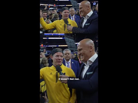 Michigan head coach reacts after team wins NCAA championship