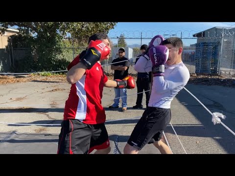 Mouth piece flys as Undefeated pro Boxer VS Amateur Boxer go at it