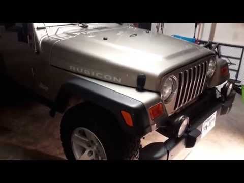 Installing a rough country 4 inch lift kit on a jeep tj (video 2)