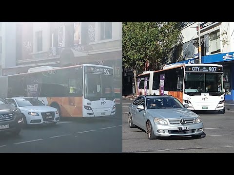 Two Scania K360UA's meet at Melbourne CBD
