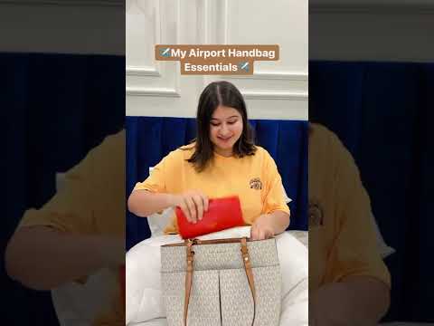 What’s inside my Airport Handbag?✈️💛🤩 #shorts