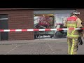 Automobilist rijdt winkel binnen op Eskerplein in Almelo