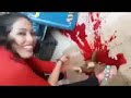 Two Girls Slaughtering A Sheep