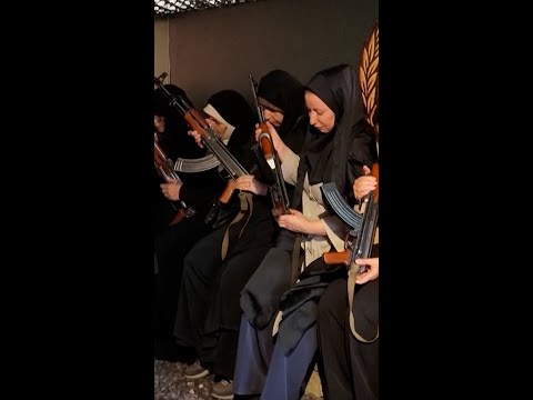 Iranian women take part in military training in Tehran