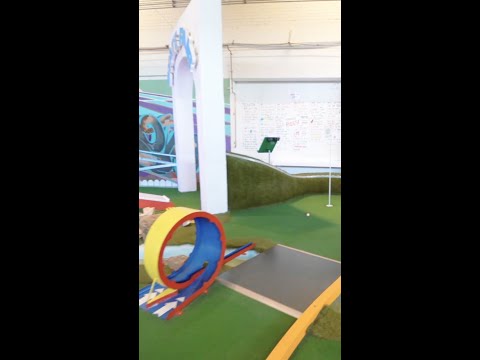 Hole in one through a loop! 🥳 #shorts