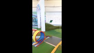 Hole in one through a loop! 🥳 #shorts