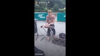 Bradford Cox playing music at Union Square, Manhattan