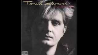 Flowers in the concrete by Tom Cochrane