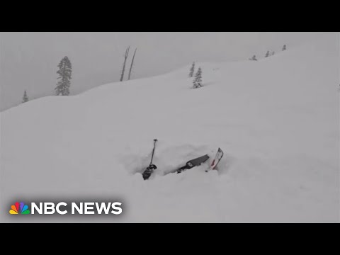 Skiers rescue man trapped in snow