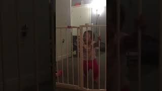 Baby learns to open the Regalo Baby Gate