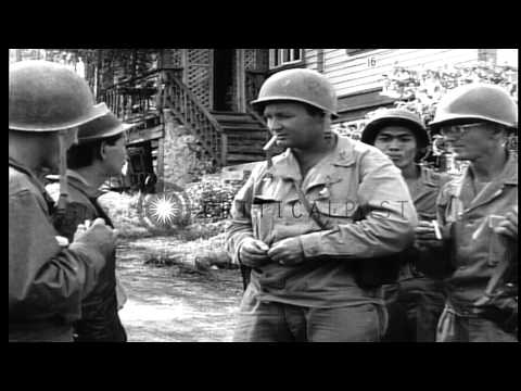 Military police checks and arrests Japanese collaborators and people show "V" for...HD Stock Footage