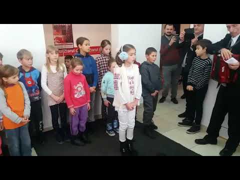 Copiii din Scoposeni au colindat și urat la ZDI