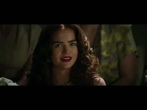 I Saw the Light trailer frame: Tom Hiddleston as Hank Williams on a spotlighted stage mic