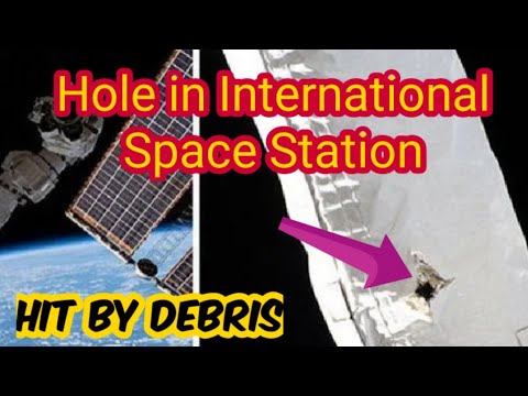 Hole In Canadarm Hit By Debris | Orbital debris strikes ISS robotic arm, leaves a mark