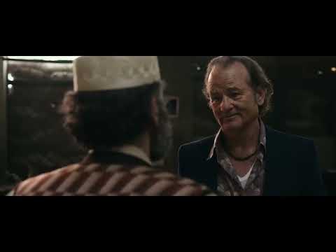 Rock the Kasbah official trailer still: Bill Murray’s Richie Lanz stares at a Kabul nightscape lit by market lights