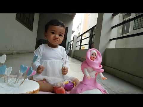 Kyra's First Birthday: Kyra with the Cakes.