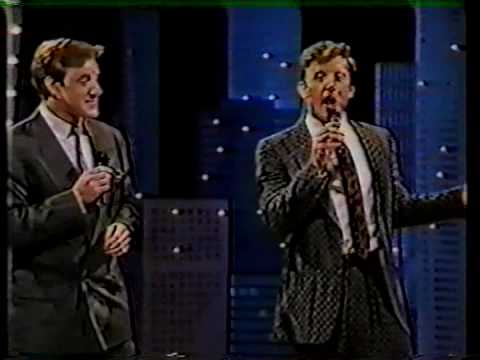 Anthony Warlow and Simon Burke singing