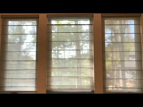 Hunter Douglas woven Roman shades with PowerView