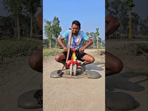 A Little boy is having fun with his bicycle?