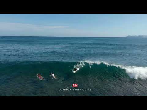 Drone footage of surfers and waves at Mawi