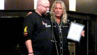 Darrell Mansfield is presented with Blues Hall of Fame inductee certificate by Johnny Mannion