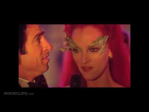 Batman & Robin trailer image focusing on Bat-symbol and slick production design