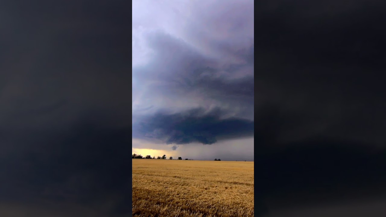 Picturesque supercell over Central Oklahoma near Kingfisher producing massive baseball-size hail.