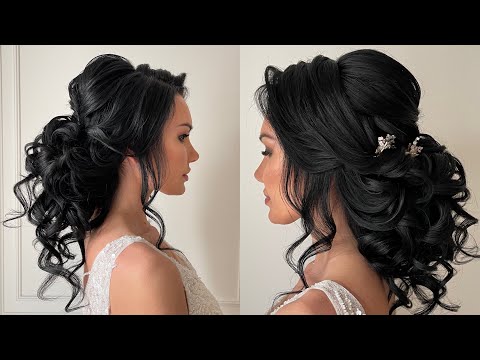 Curly low bun wedding hairstyle