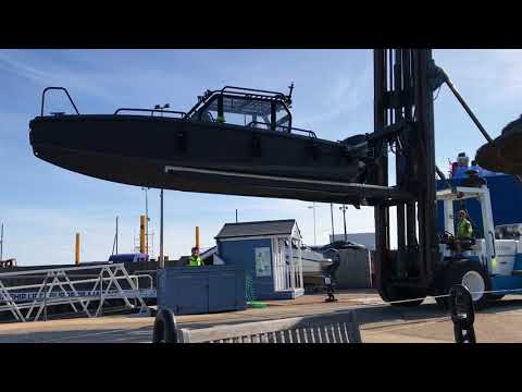 Launching an XO Boats' Defender (XO DFNDR) by forklift from a drystack