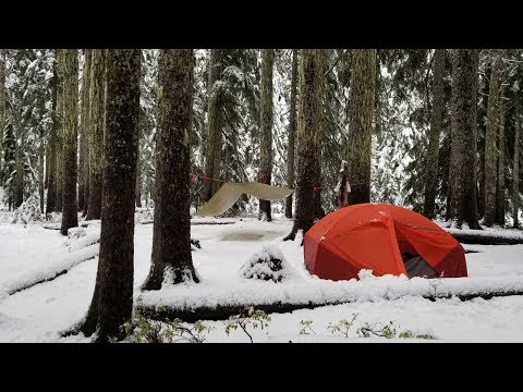 Backpacking in a snow storm. Yellow snow everywhere!