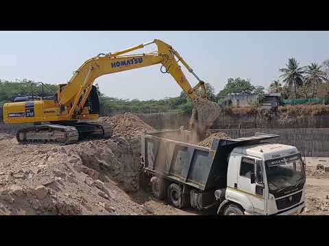 KOMATSU PC210-10M0 Excavator operator working Damfar loading karte huye mitty