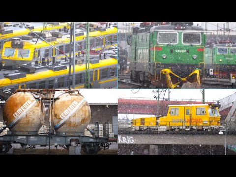 Tåg runt om i Göteborg i snöoväder - April 2022 - 4k60 / Trains in Gothenburg in Snow