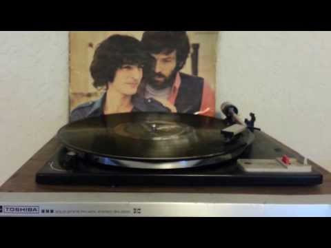 Enjoying  the record "Shablul" by Arik Einstein and Shalom Hanoch on my old Toshiba phonograph