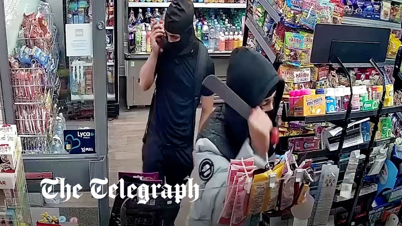 Watch: Machete-wielding robbers trapped inside store - Vimarsana News