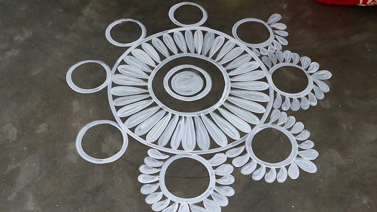 very simple alpana design for laxmi puja by shyamali rangoli art