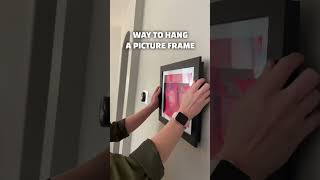 😳 This is a GENIUS LIFE HACK for hanging picture frames on the wall! #shorts #lifehack #hack #mom
