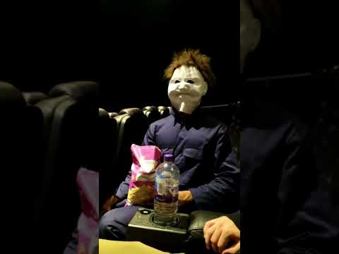 Michael Myers eating popcorn