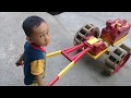 A Toy Rice Field Tractor With Sengon Wood And Former Building Plywood
