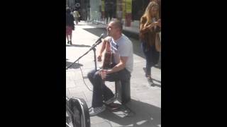 Dublin busker singing go on home British soldiers in dublin