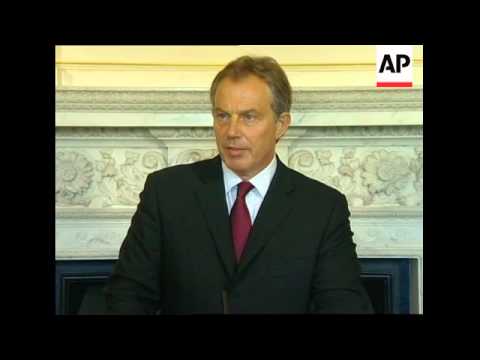 British PM makes address to nation after arriving back in London