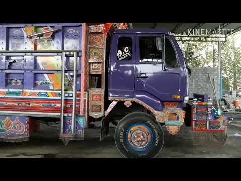 UD Nissan diesel pakistani truck unloading steel sheets