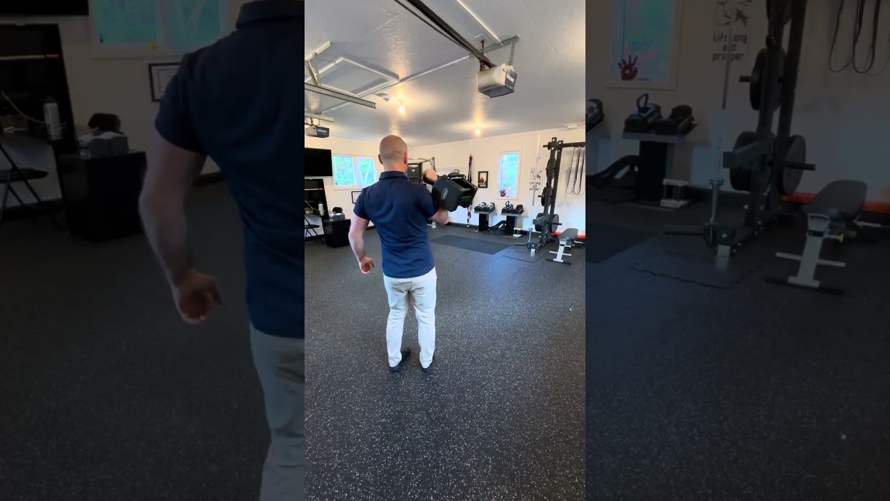 2. Racked One Arm Kettlebell Carry (Front/Back View)