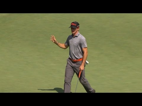 Morgan Hoffmann guides a 36-foot putt in for birdie at Deutsche Bank