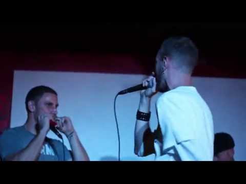 SirReal, Ender One, and DJ Arctic smoking weed on stage at a show