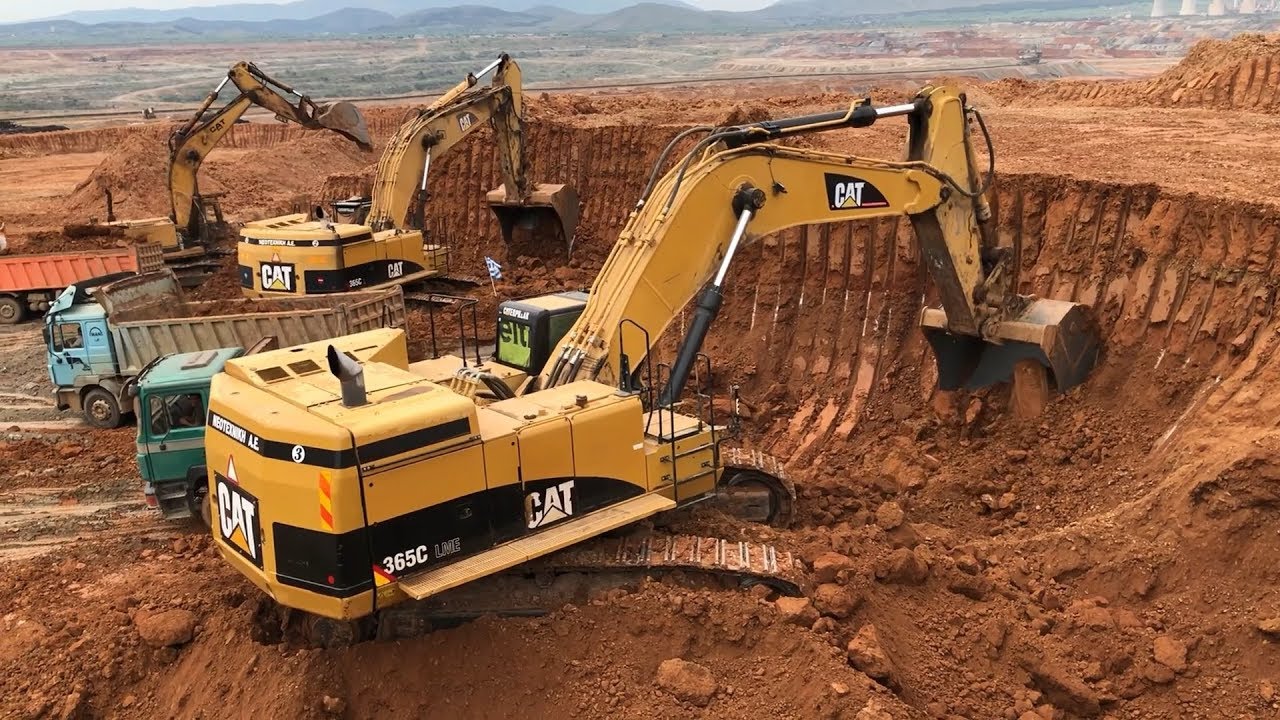 Caterpillar 365C Excavator Loading Trucks And Operator View