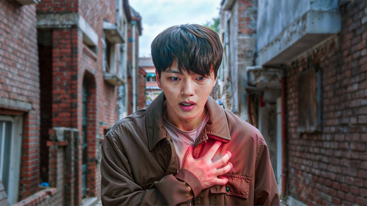 The boy's heart is linked to a girl's, causing the two to share the same beat and emotions.