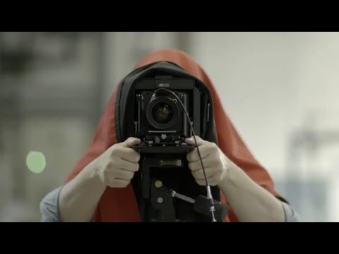 Mark Power shooting backstage for Reda1865 150th Anniversary