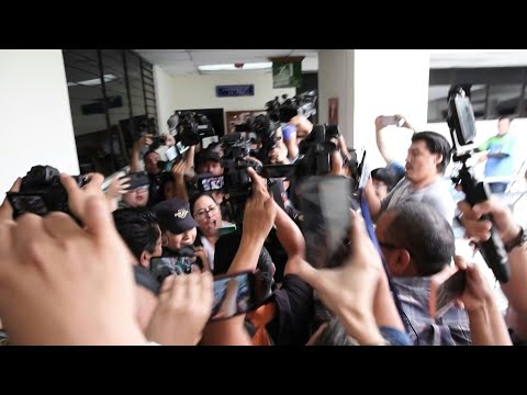 Detained human rights activist Ruth Lopez arrives to court to face corruption charges | AFP