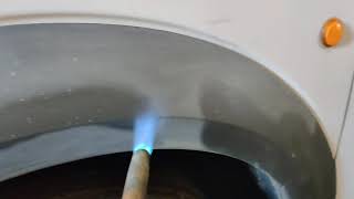 Repairing faded plastic trim with a blowtorch