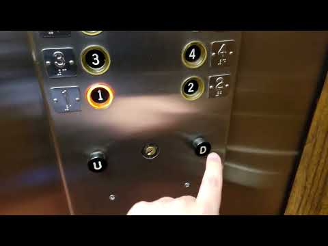 1965 Otis Pre-Lexan buttons at Melbourne Tower